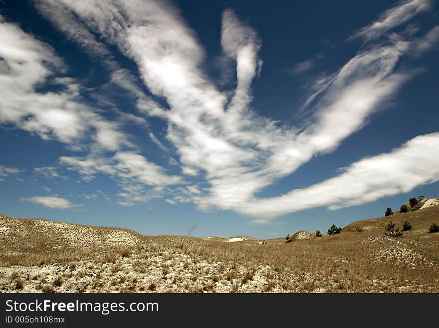 Blue sky above dunes