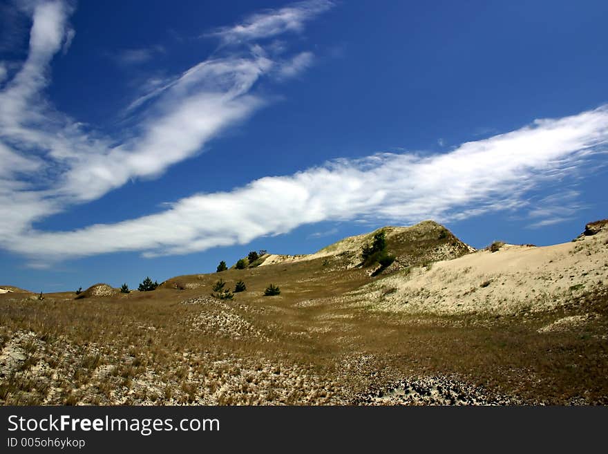 Blue sky above dunes. Blue sky above dunes