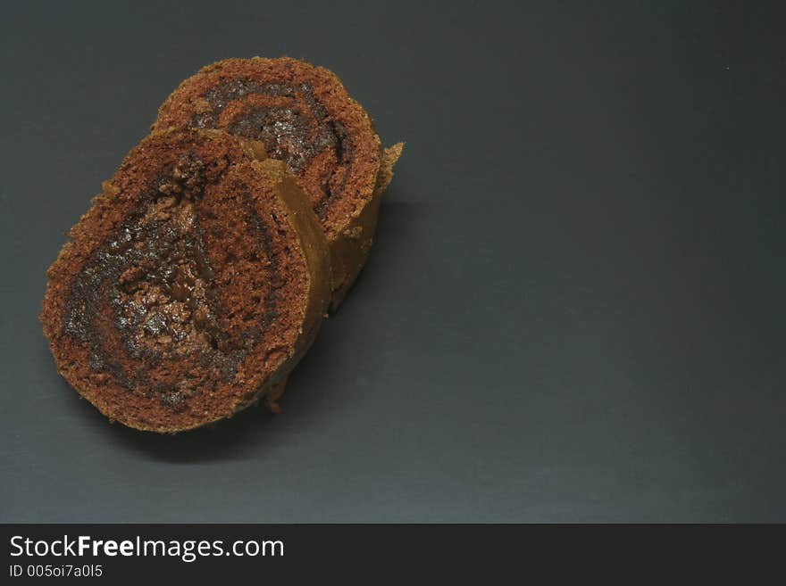 Chocolate Cake Isolated Against A Black Background - Yummy !!!