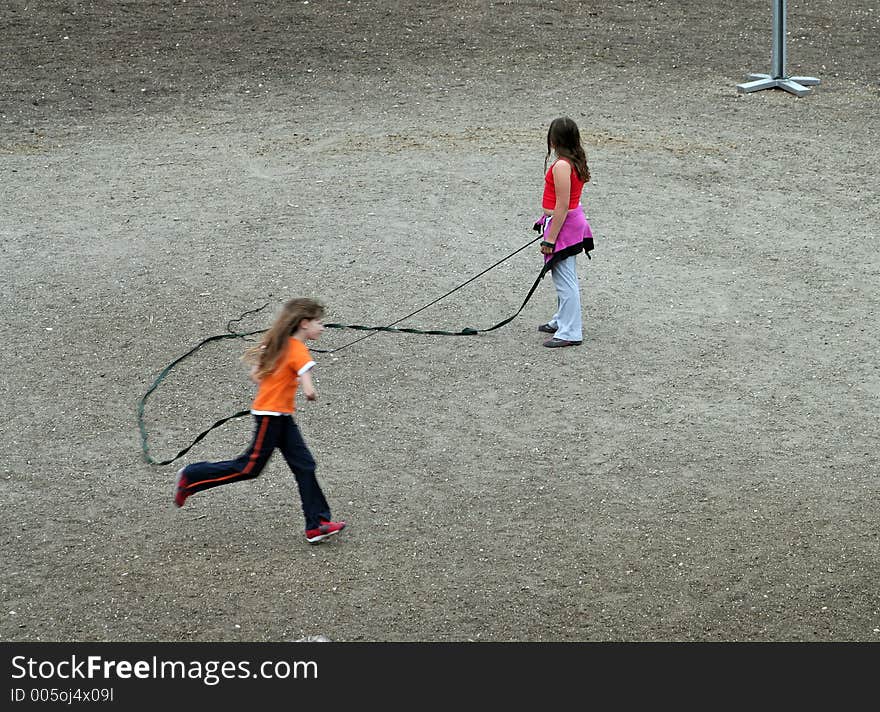 Two girls playing with a thong and horsewhip. Two girls playing with a thong and horsewhip