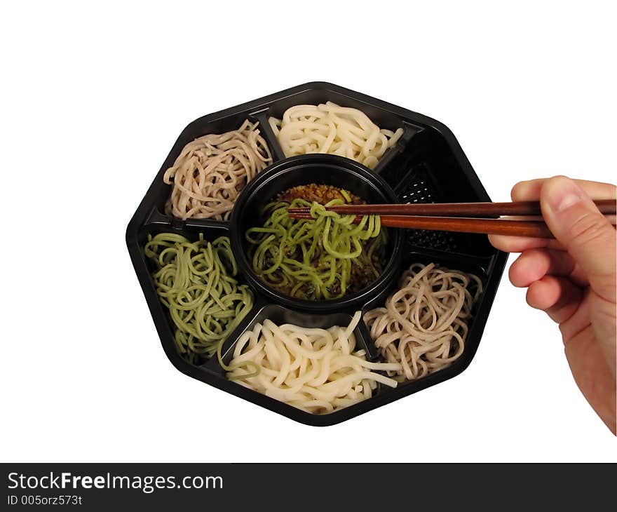 Soba lunch box with a hand and chopsticks isolated over white background with clipping path. Soba lunch box with a hand and chopsticks isolated over white background with clipping path