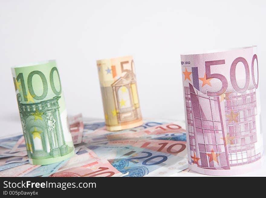 Rolled european papermoney on white background. Rolled european papermoney on white background