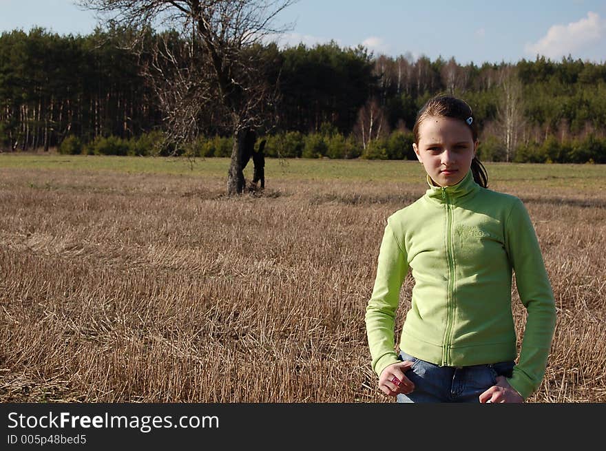 Sunny weather with shy teenager in the forest