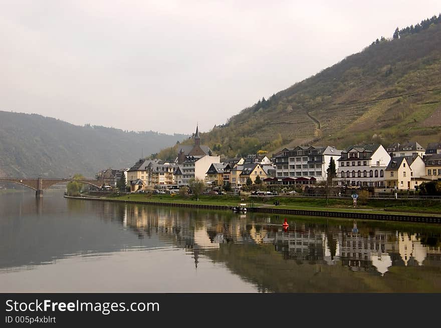 Cochem is a town in Rhineland-Palatinate, western Germany, capital of the district Cochem-Zell. It is situated in the valley of the Mosel, at the foot of a hill surrounded by a feudal castle dating from 1051.