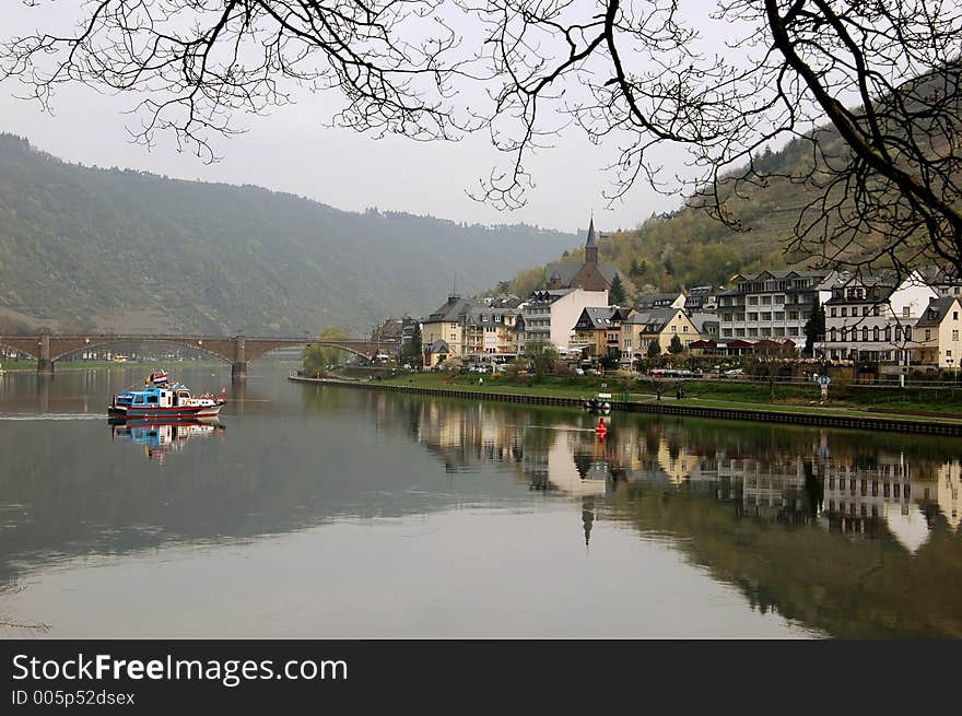 Cochem is a town in Rhineland-Palatinate, western Germany, capital of the district Cochem-Zell. It is situated in the valley of the Mosel, at the foot of a hill surrounded by a feudal castle dating from 1051.