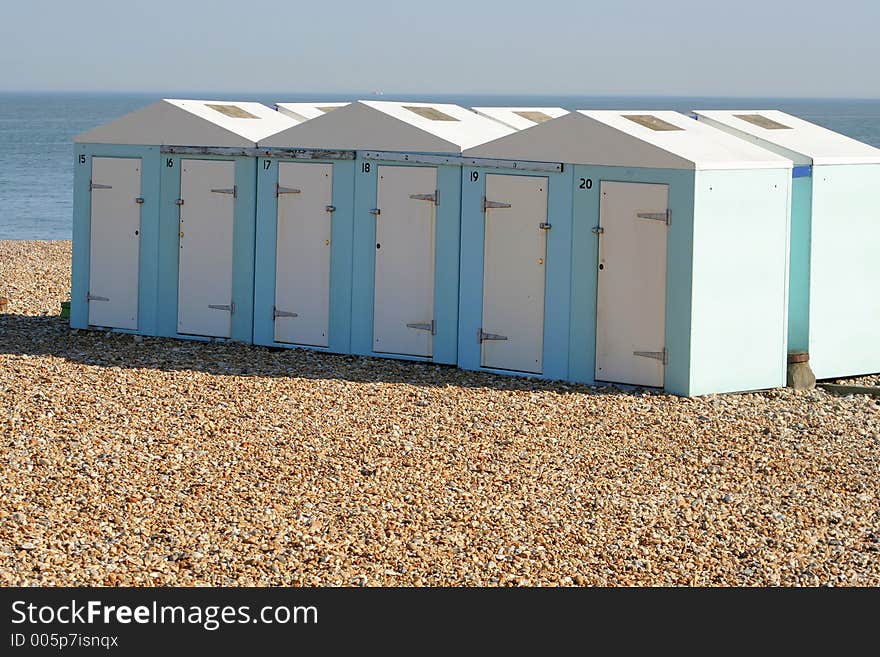 Line of seaside huts on Eastbourne beach, Sussex. Line of seaside huts on Eastbourne beach, Sussex