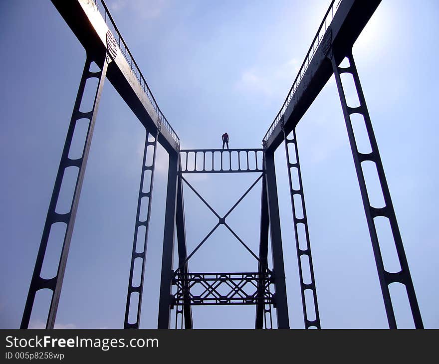 Man staying on the top of the high bridge. Man staying on the top of the high bridge