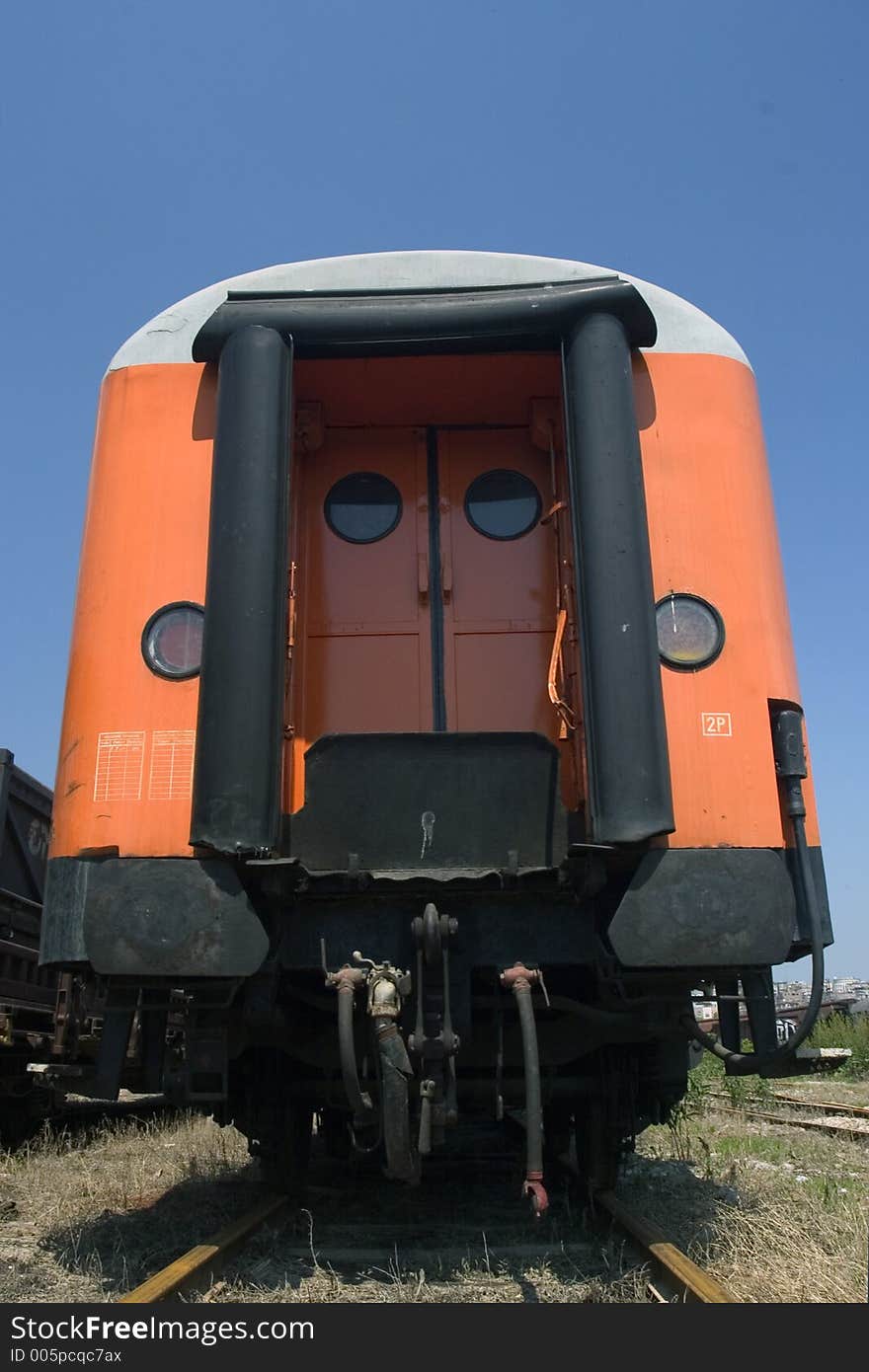 Orange waggon on railway