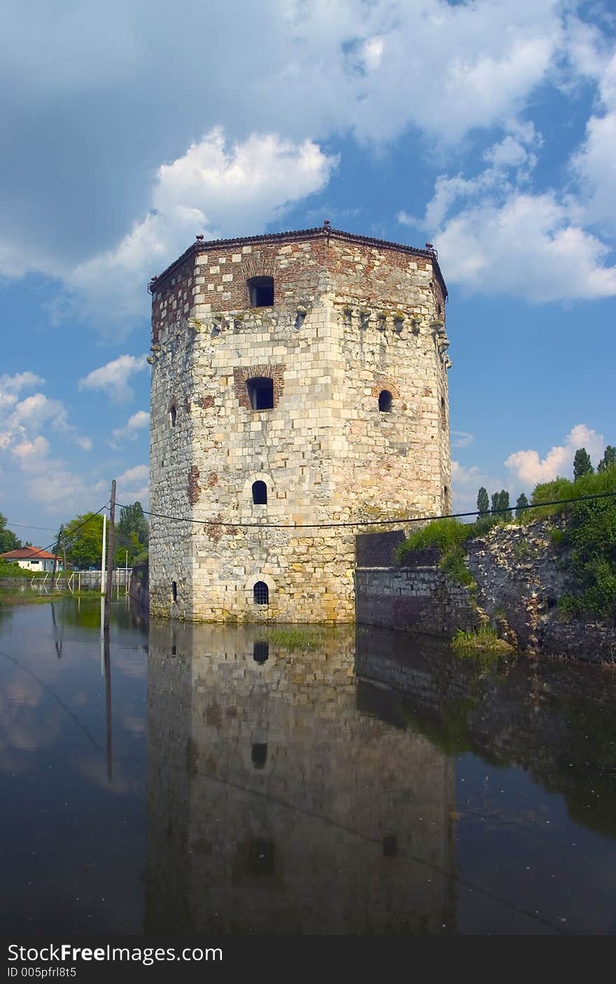 Very old tower on the water