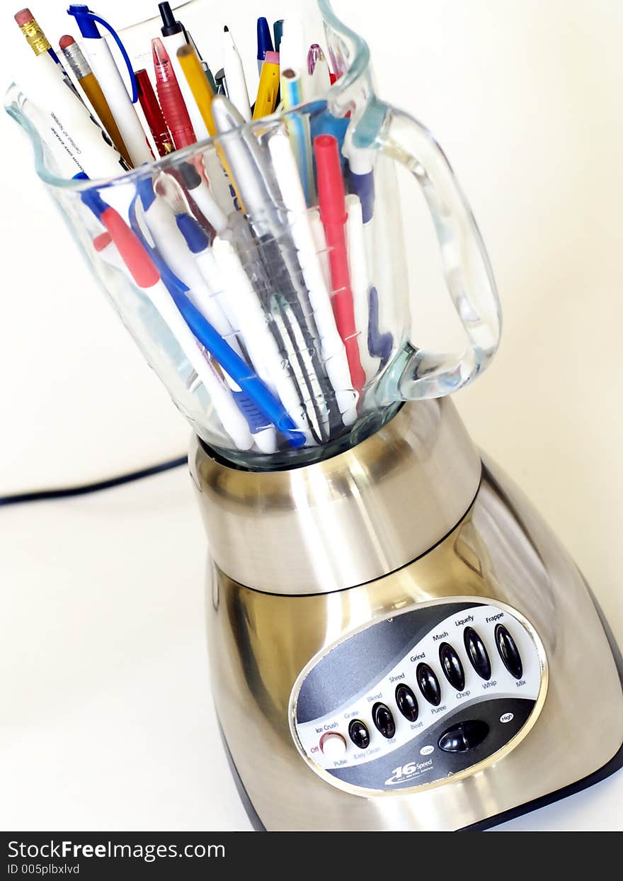 Blender Full Of Pens And Pencils