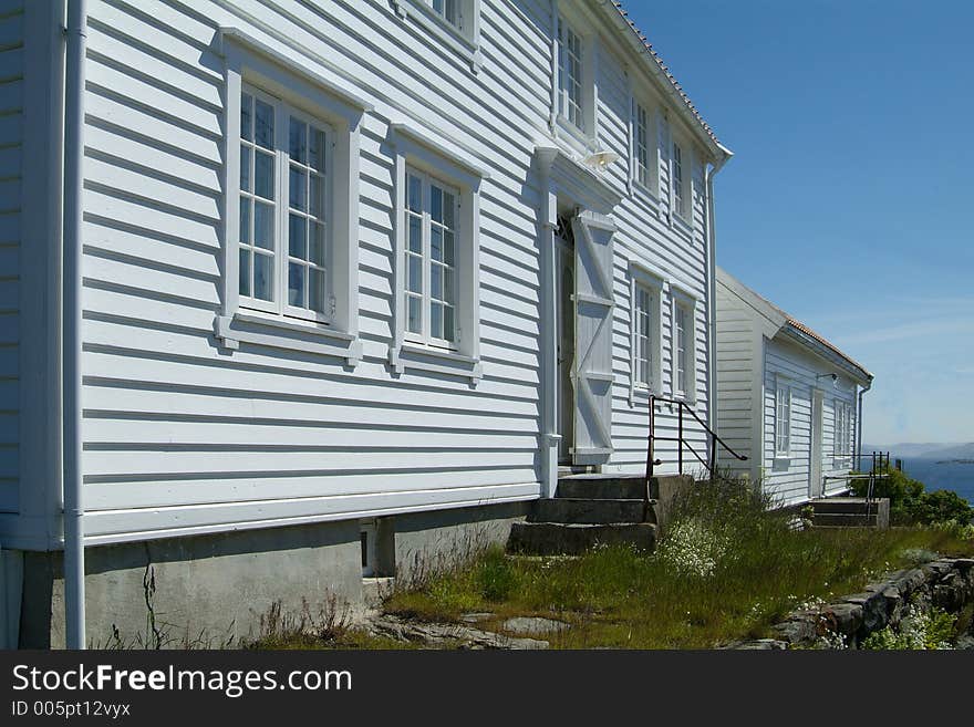 Old, traditional, wooden houses in Loshavn near Farsund, Vest-Agder on the south coast of Norway. Old, traditional, wooden houses in Loshavn near Farsund, Vest-Agder on the south coast of Norway