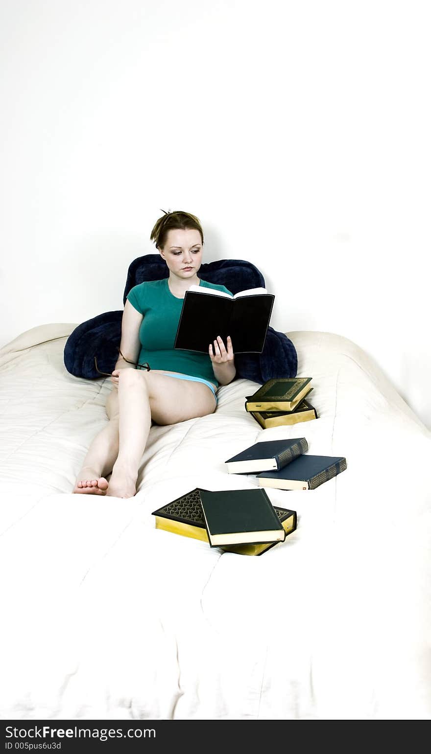 Female student reading books