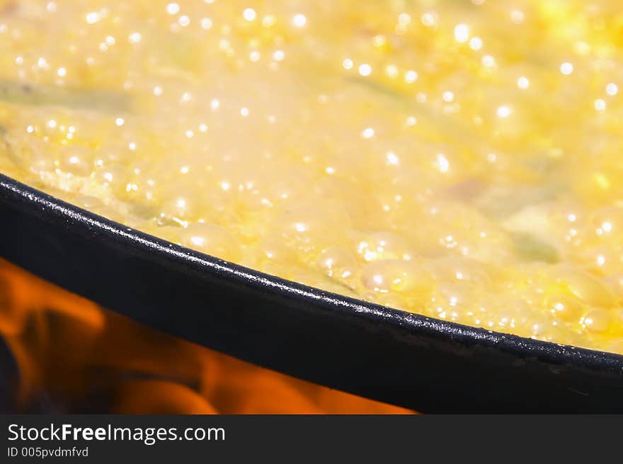 Boiling paella, typical food of Spain