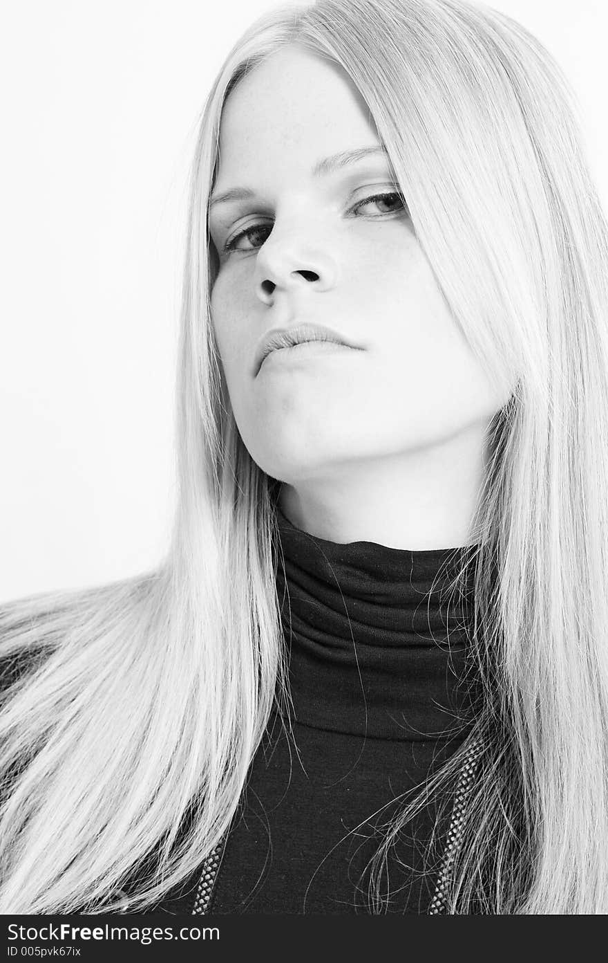 It is black a white photo of the woman with long light hair. The photo is made in a high key. By Elle Nova. It is black a white photo of the woman with long light hair. The photo is made in a high key. By Elle Nova