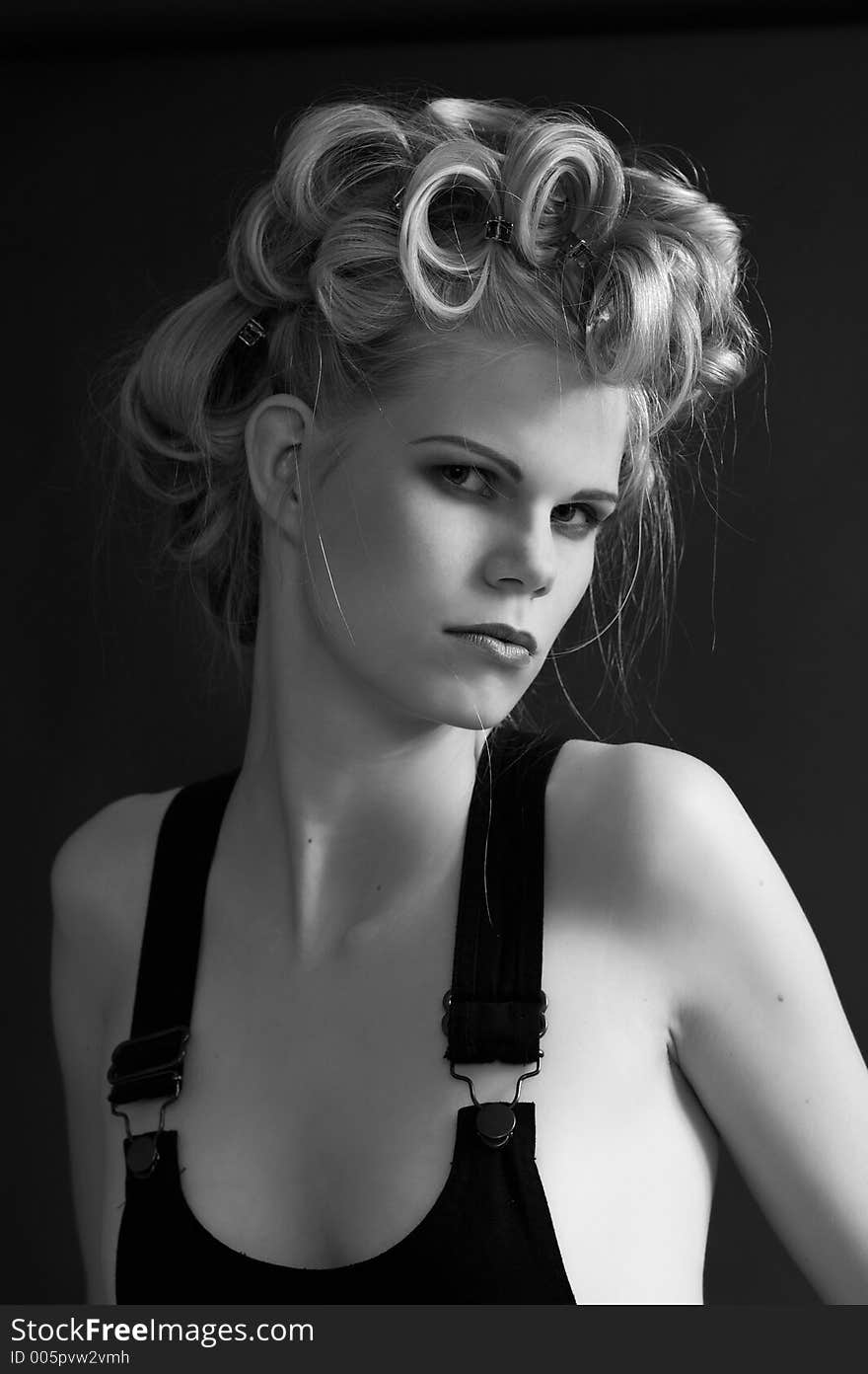 It is black a white photo of model with an evening make-up and an original hairdress. The photo is in style beauty. The photo is made with use soft filter. Photo 2. It is black a white photo of model with an evening make-up and an original hairdress. The photo is in style beauty. The photo is made with use soft filter. Photo 2