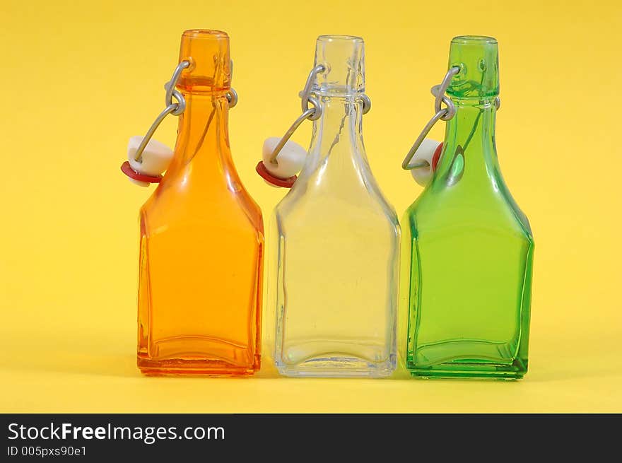 Three shiny bottles