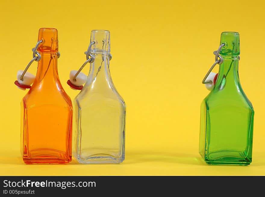 Three shiny bottles