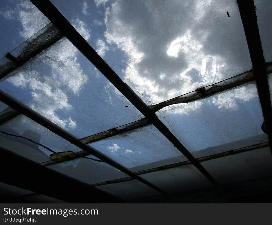 cloud background as seen through some dirty abstract windows. cloud background as seen through some dirty abstract windows