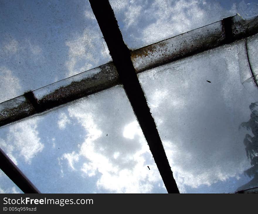 A cloud background as seen through some dirty abstract windows. A cloud background as seen through some dirty abstract windows