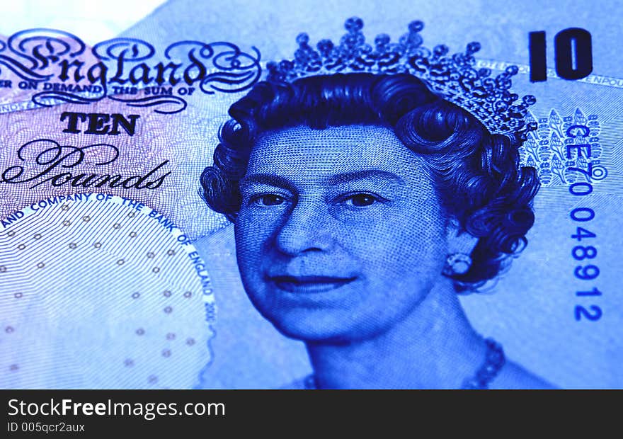 Shot of English pounds in blue tint