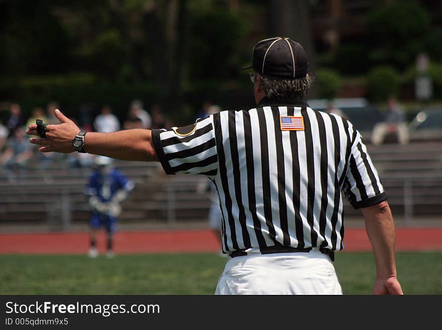 Referee making the call. Referee making the call.