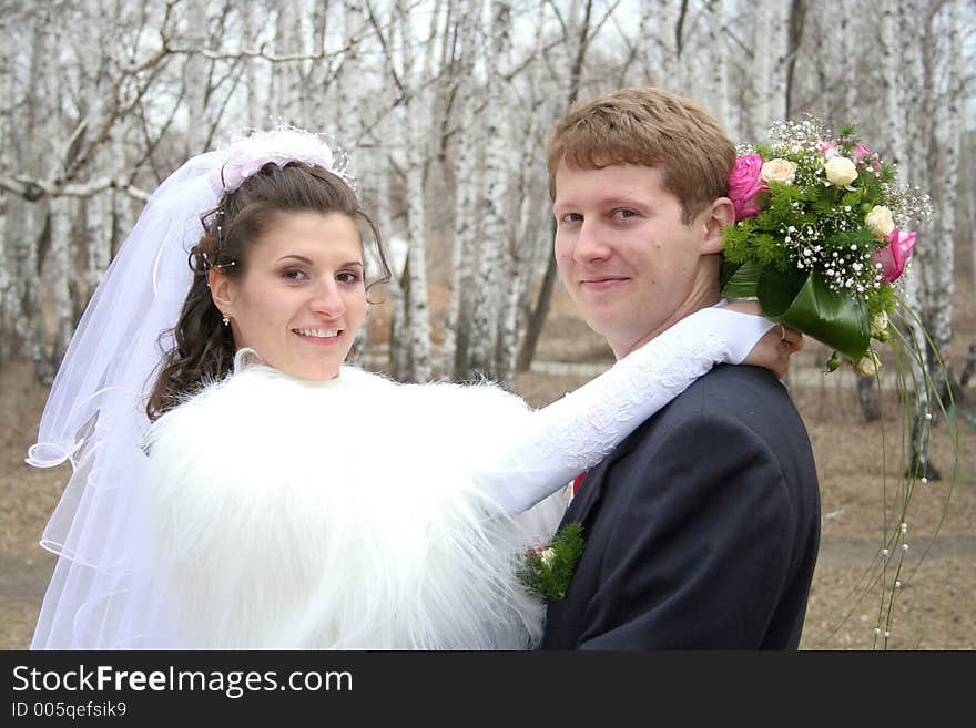 Portrait newlyweds in park. Portrait newlyweds in park