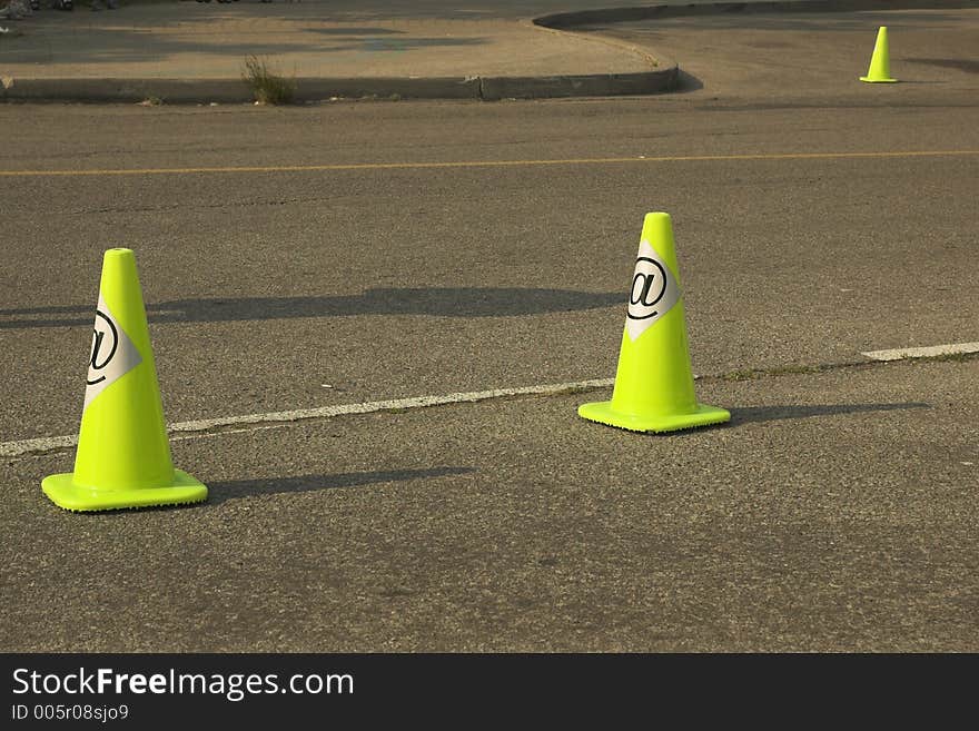 Bright yellow construction cones on information highway