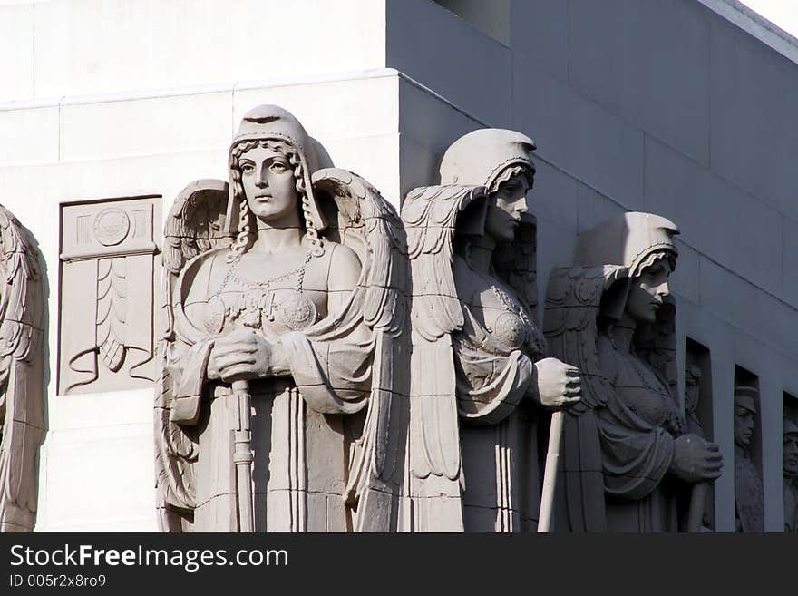 Stone angels on building. Stone angels on building.