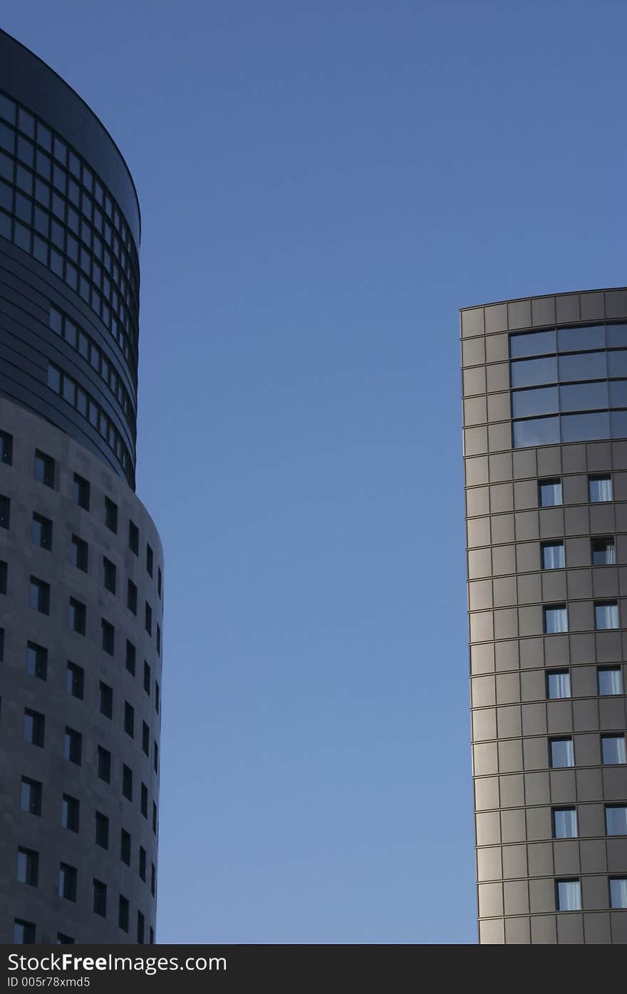 Modern office building on blue sky. Modern office building on blue sky