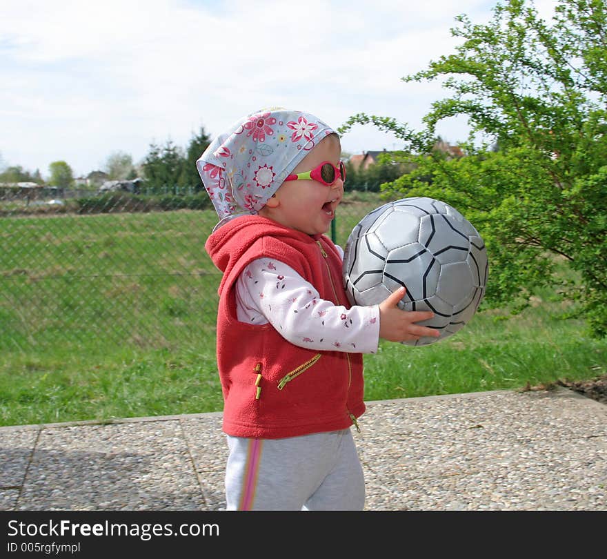 Girl with coccer ball. Girl with coccer ball