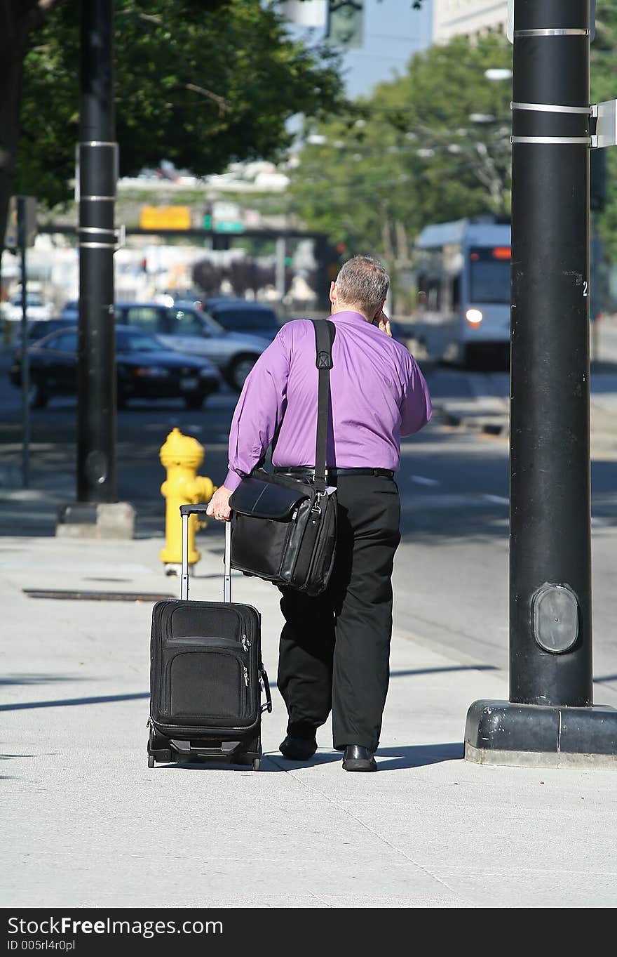 Business man walking to work