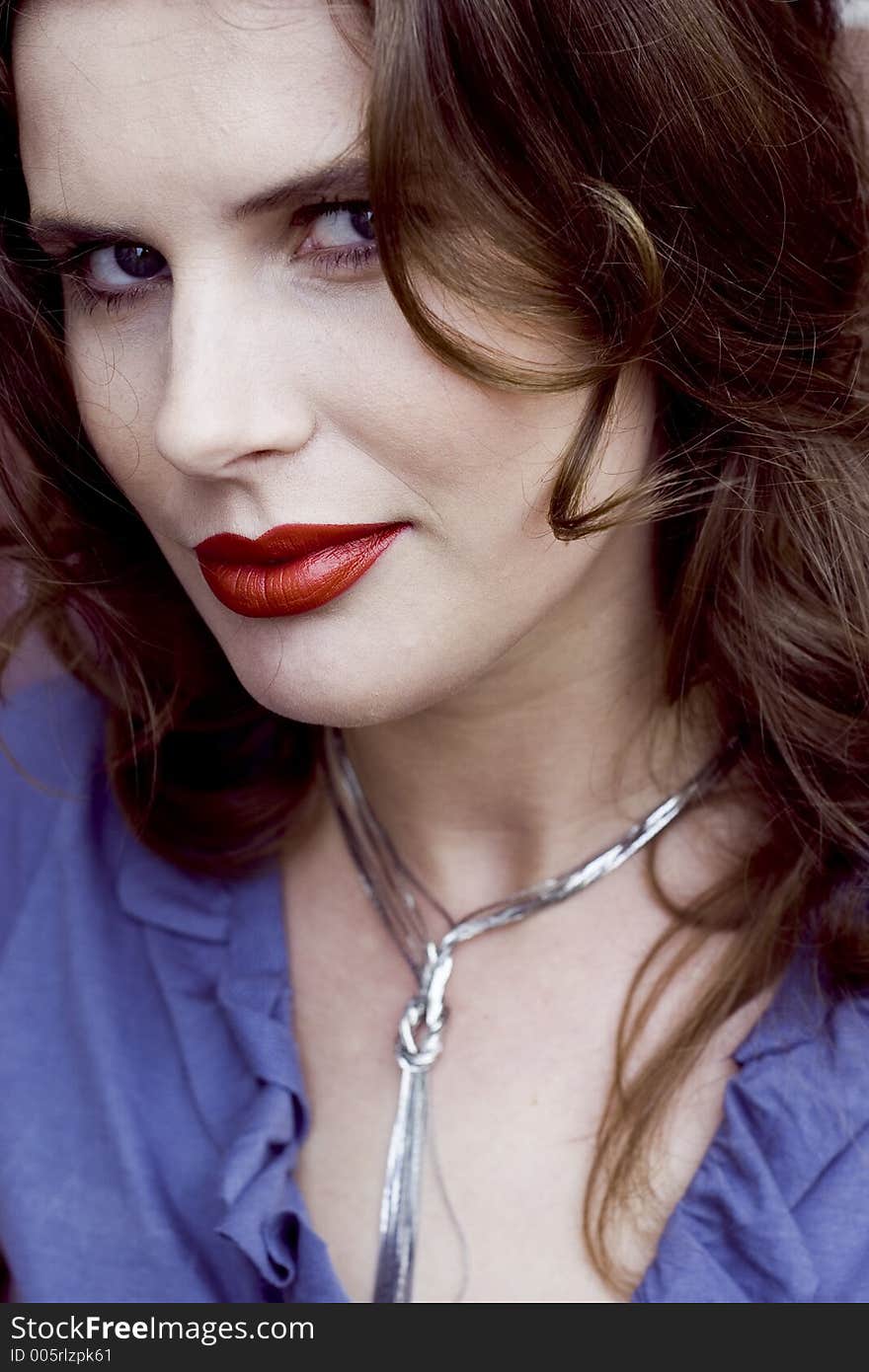 Close Up of a Beautiful Brunette Woman with Red Lips. Close Up of a Beautiful Brunette Woman with Red Lips