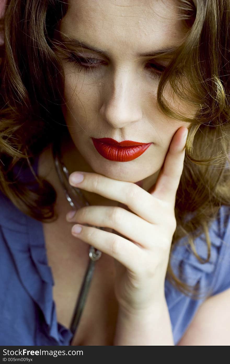 Close Up of a Beautiful Brunette Woman with Red Lips. Close Up of a Beautiful Brunette Woman with Red Lips