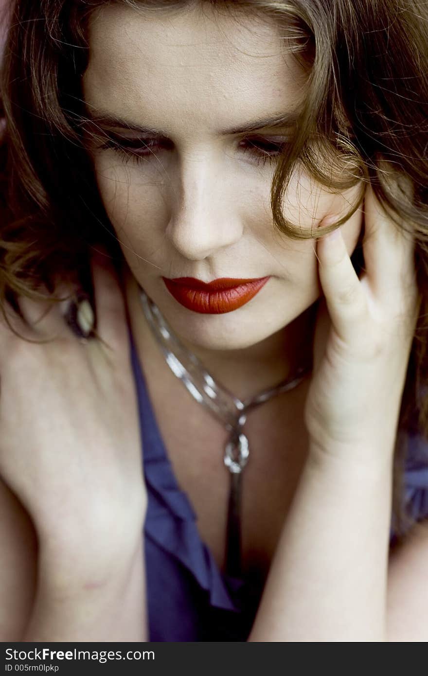 Close Up of a Beautiful Brunette Woman with Red Lips. Close Up of a Beautiful Brunette Woman with Red Lips