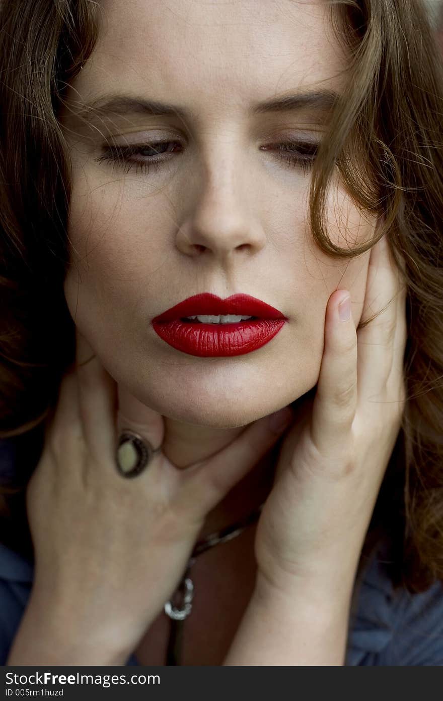 Close Up of a Beautiful Brunette Woman with Red Lips. Close Up of a Beautiful Brunette Woman with Red Lips