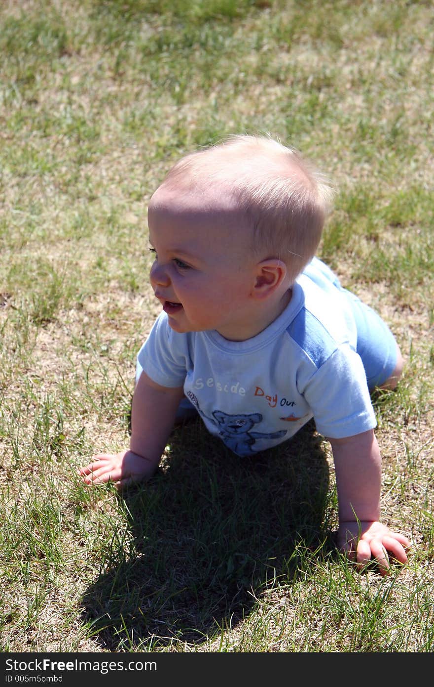 Little Boy In Grass