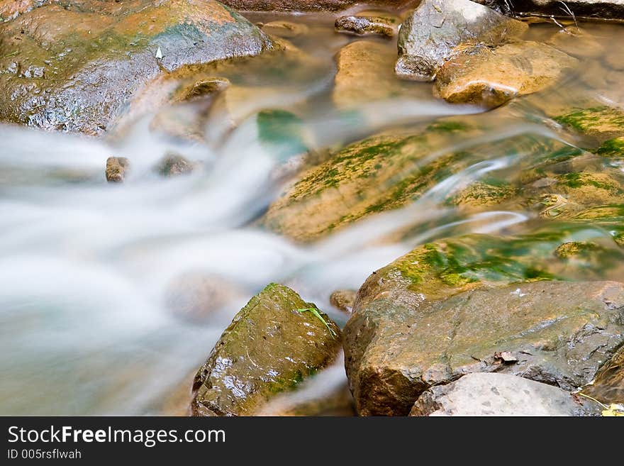 Flowing stream at Bois de Liesse park