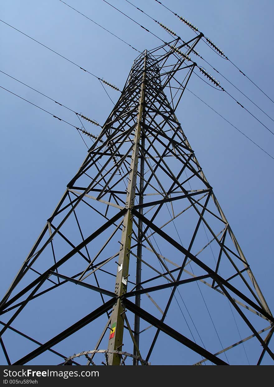 A tower of electricity that provides to the neighboring communities. A tower of electricity that provides to the neighboring communities