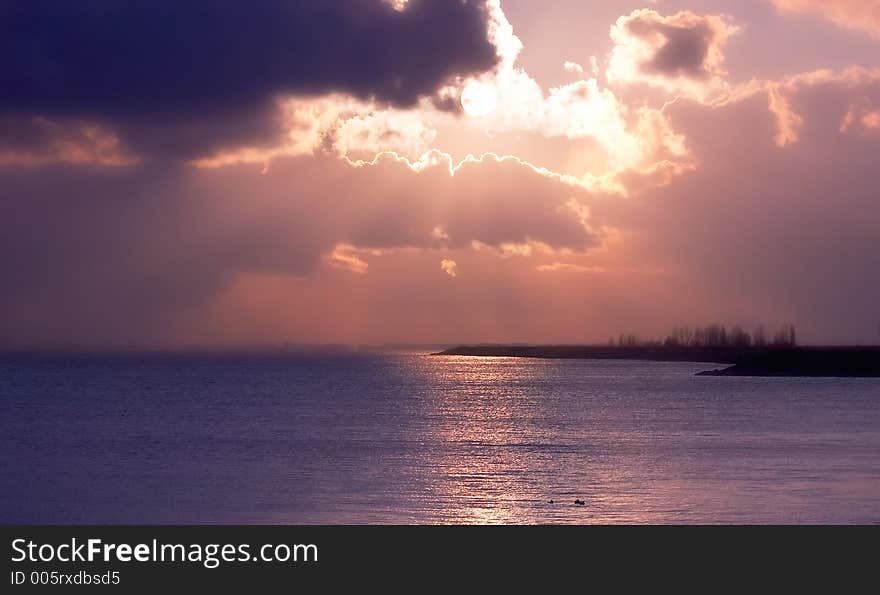 Beautiful sunset on a lake in the Netherlands. Beautiful sunset on a lake in the Netherlands