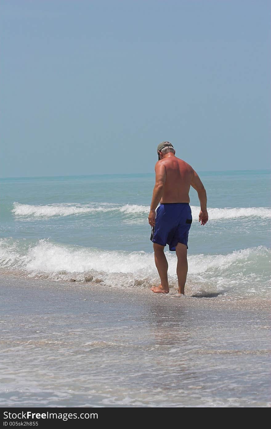 Man enjoying day at the beach. Man enjoying day at the beach