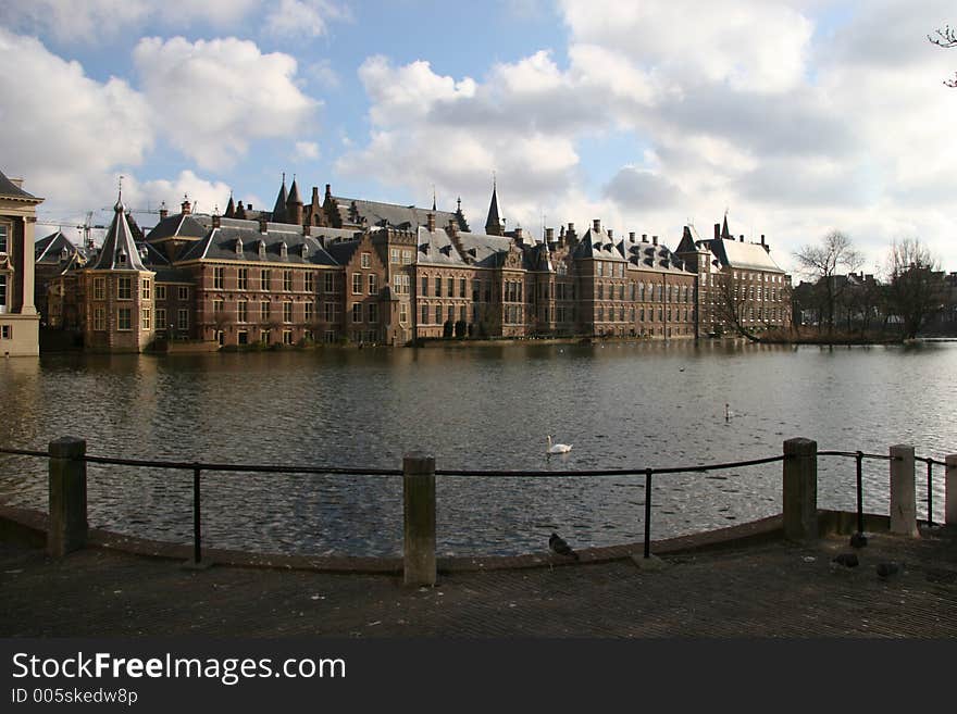 Hofvijver is a small lake on the outside of the upper house of the dutch parliament. To the left is the Mauritshuis a world famous gallery containing works of the dutch masters and to the right is the original dutch parliament building and now the upper chamber (house) of parliament. The dutch parliament is located in the The Hague.