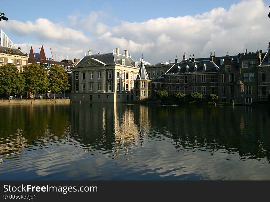 Hofvijver is a small lake on the outside of the upper house of the dutch parliament. To the left is the Mauritshuis a world famous gallery containing works of the dutch masters and to the right is the original dutch parliament building and now the upper chamber (house) of parliament. The dutch parliament is located in the The Hague. Hofvijver is a small lake on the outside of the upper house of the dutch parliament. To the left is the Mauritshuis a world famous gallery containing works of the dutch masters and to the right is the original dutch parliament building and now the upper chamber (house) of parliament. The dutch parliament is located in the The Hague.