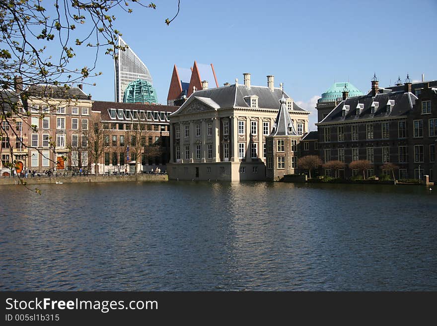 Hofvijver is a small lake on the outside of the upper house of the dutch parliament. To the left is the Mauritshuis a world famous gallery containing works of the dutch masters and to the right is the original dutch parliament building and now the upper chamber (house) of parliament. The dutch parliament is located in the The Hague.