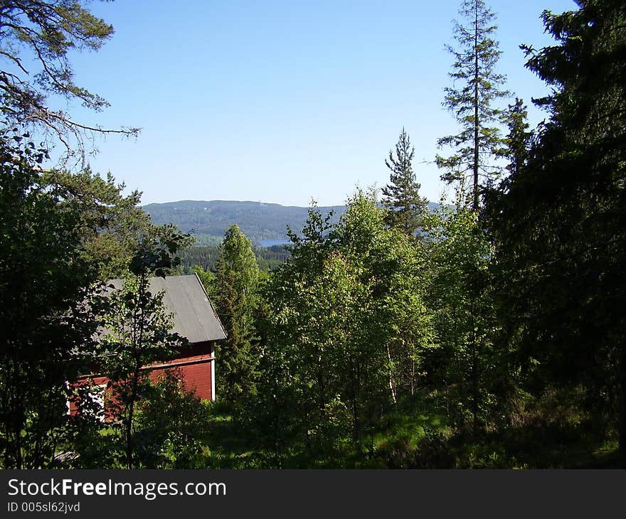 Taken toward east over the valley of Maridalen north of Oslo, just above a small cabin, formerly a small farm. Taken toward east over the valley of Maridalen north of Oslo, just above a small cabin, formerly a small farm