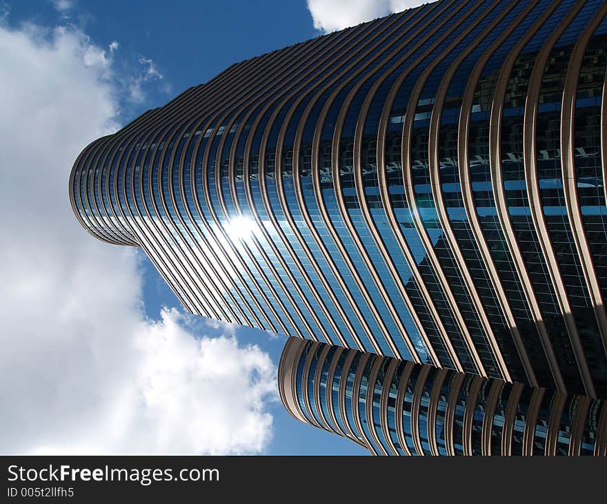 Tall blue modern building. Tall blue modern building