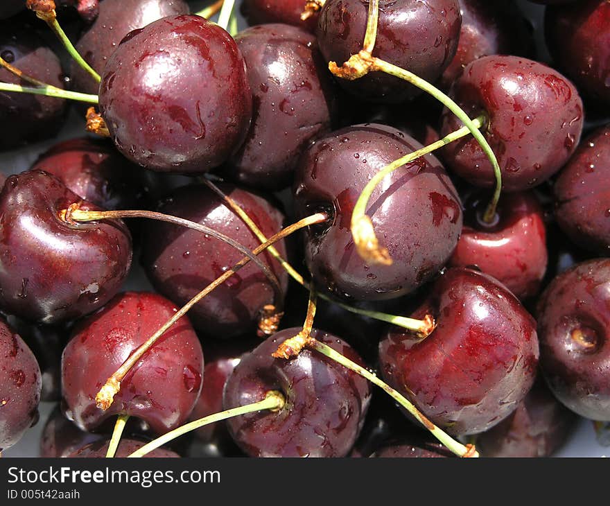 Close photo of a red cherry. Close photo of a red cherry