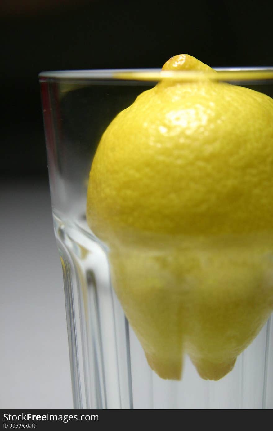 Lemon in a glass. Lemon in a glass