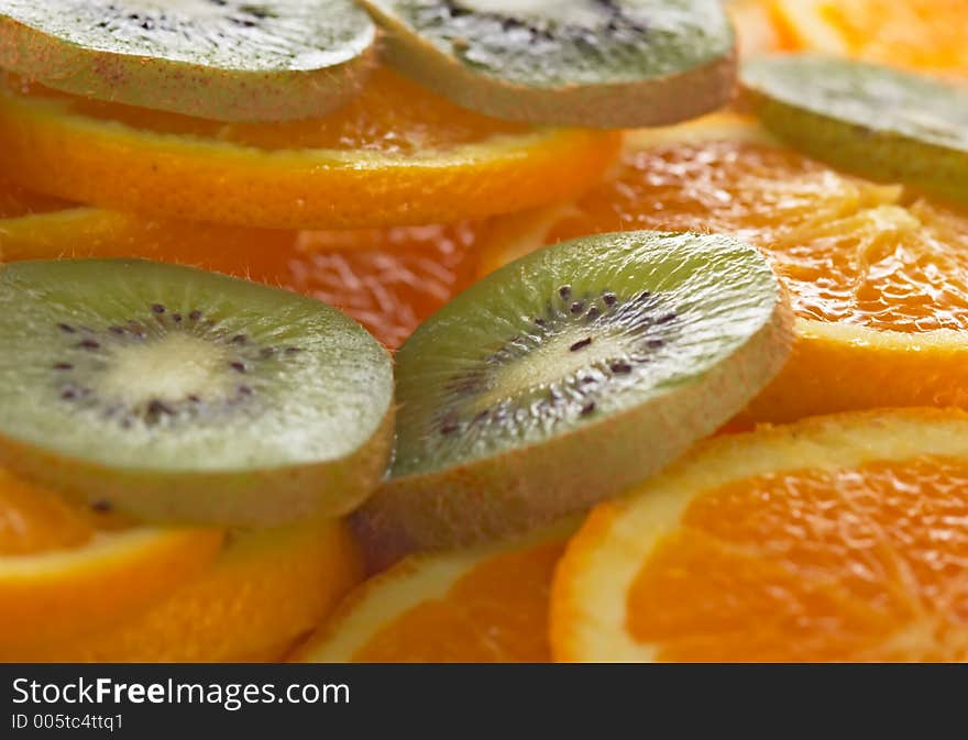 Kiwi and oranges background. Kiwi and oranges background