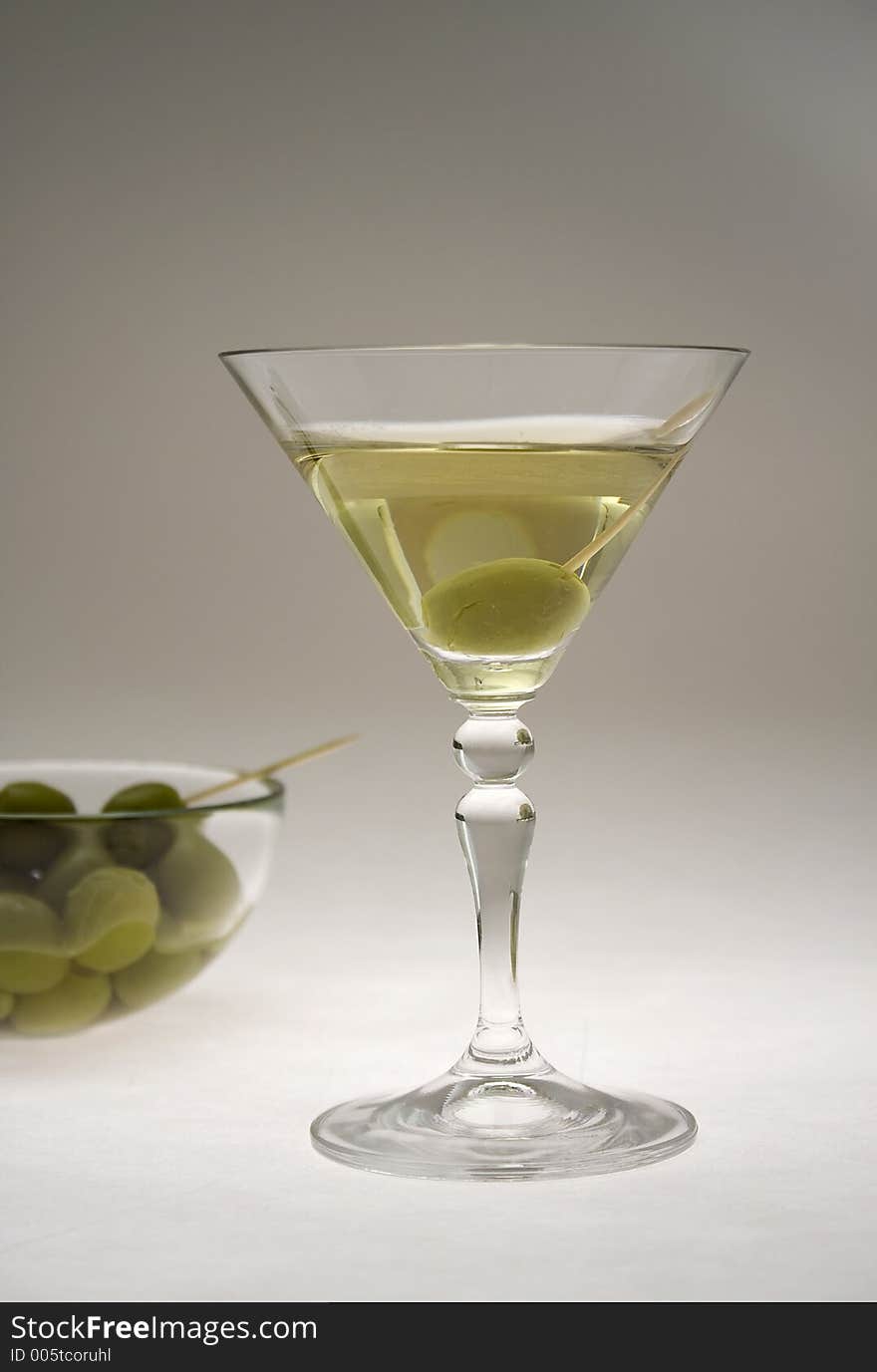 Martini glasses and olives. Martini glasses and olives