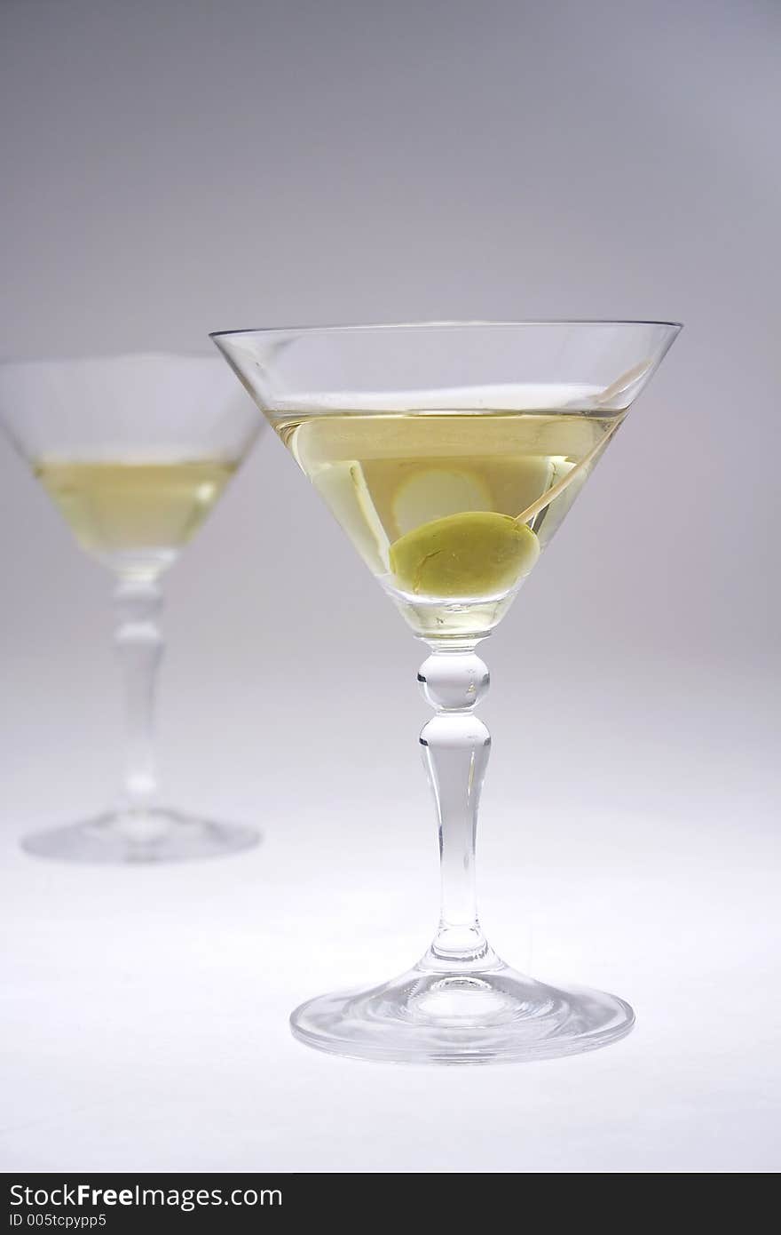 Martini glasses and olives. Martini glasses and olives